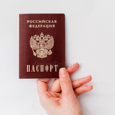 depositphotos_62899281-stock-photo-russian-passport-in-hand-on